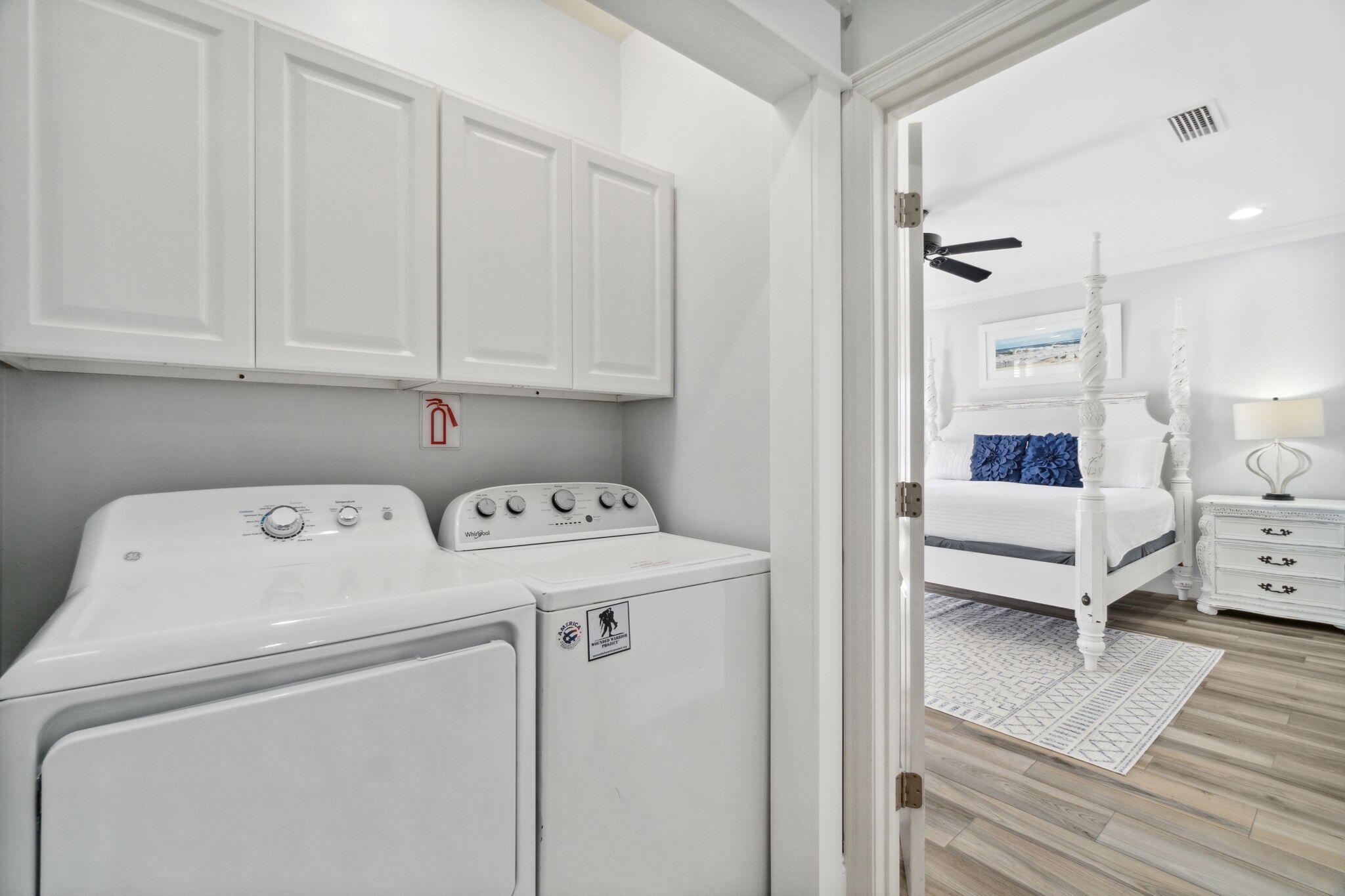 29 Sarasota Street Miramar Beach, FL 32550 - Photo 42 of 66 a view of washer and dryer with bathroom in the background