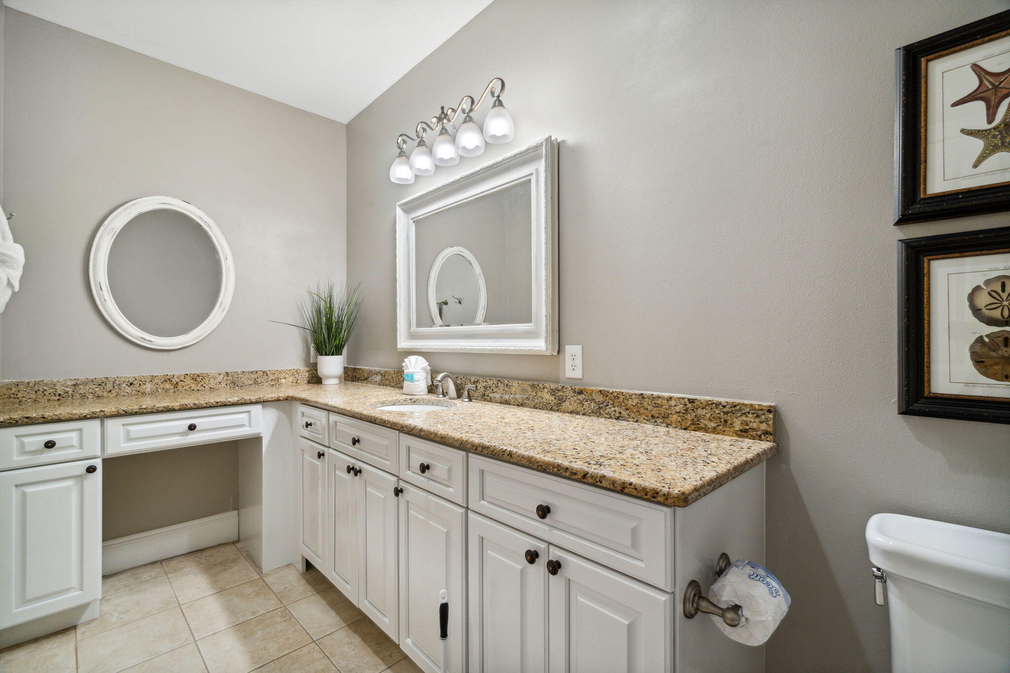 29 Sarasota Street Miramar Beach, FL 32550 - Photo 45 of 66 a bathroom with a granite countertop sink a toilet and a mirror
