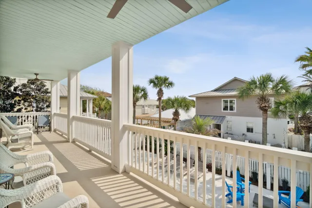a front view of a residential apartment building with a yard