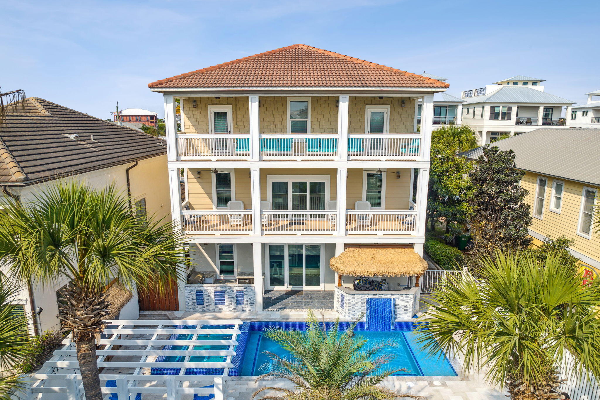 29 Sarasota Street Miramar Beach, FL 32550 - Photo 55 of 66 a front view of a residential apartment building with a yard