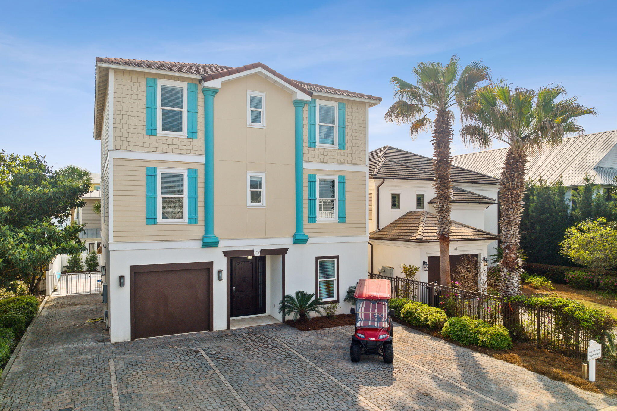 29 Sarasota Street Miramar Beach, FL 32550 - Photo 61 of 66 a front view of a house with a garden