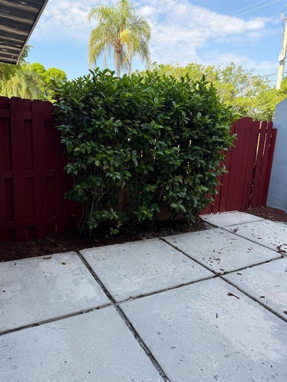 1 Crossing Circle, Unit C Boynton Beach, FL 33435 - Photo 1 of 12 a view of a backyard