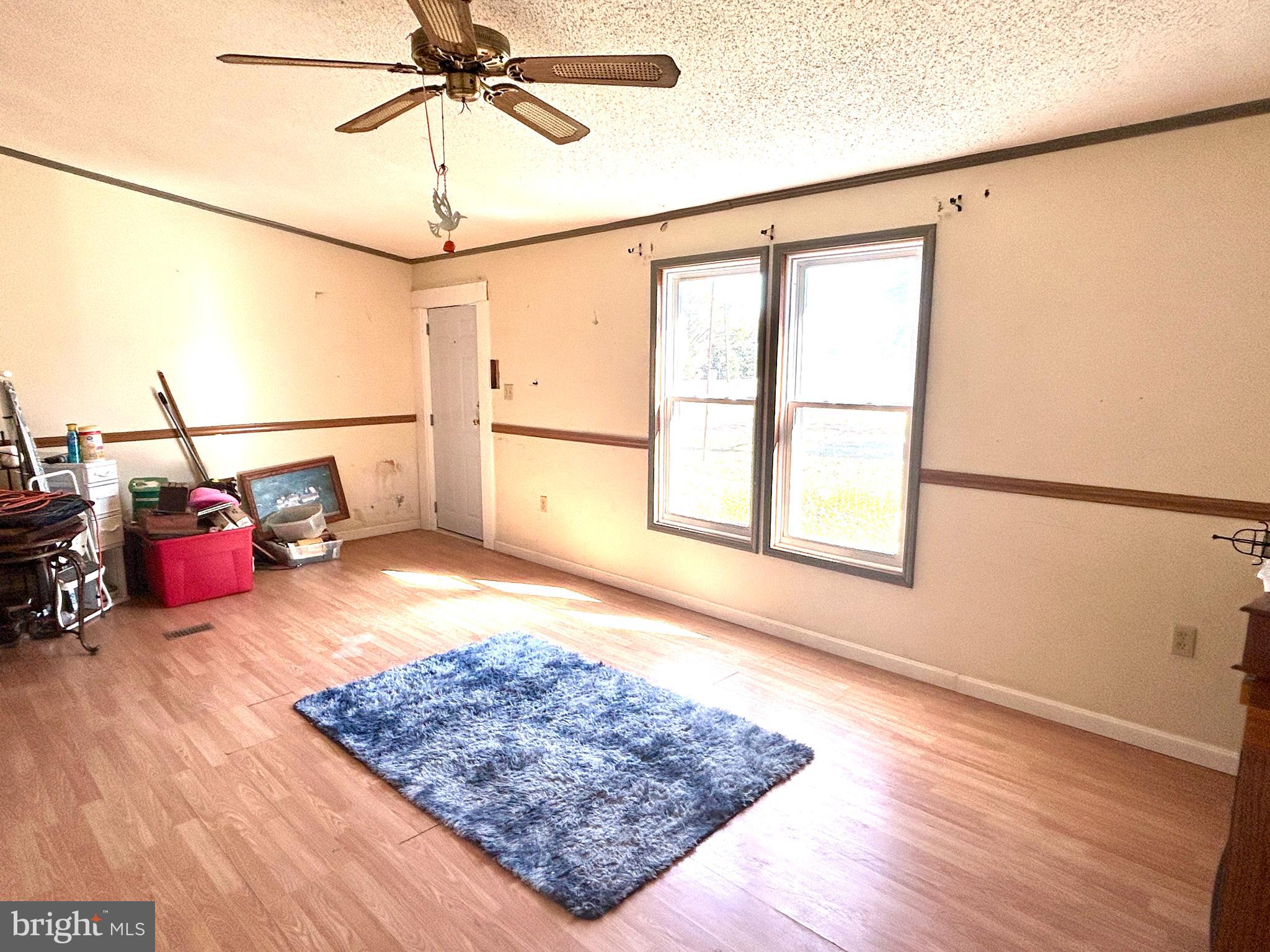 3450 Indian Bone Road Cambridge, MD 21613 - Photo 13 of 14 a view of a room with window and wooden floor