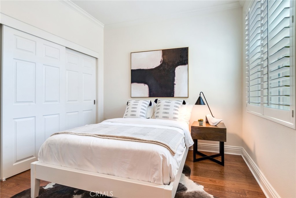 2515 Lewis Drive Tustin, CA 92782 - Photo 18 of 34 a bedroom with a bed and a window