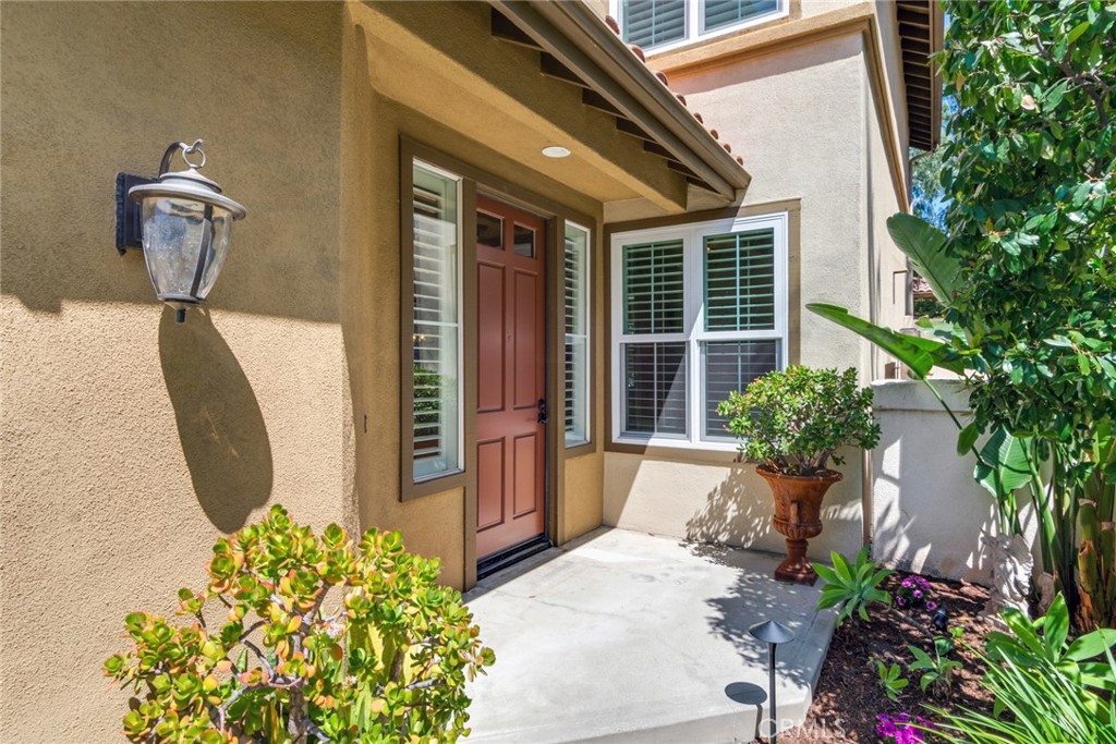 2515 Lewis Drive Tustin, CA 92782 - Photo 2 of 34 a front view of a house with garden