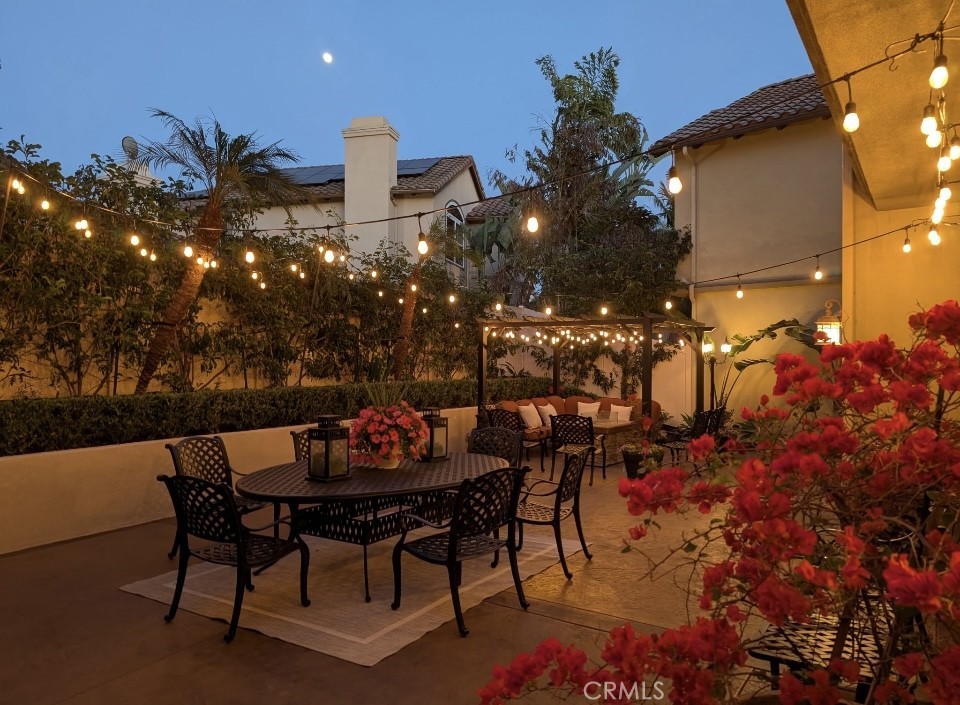2515 Lewis Drive Tustin, CA 92782 - Photo 28 of 34 a backyard of a house with table and chairs