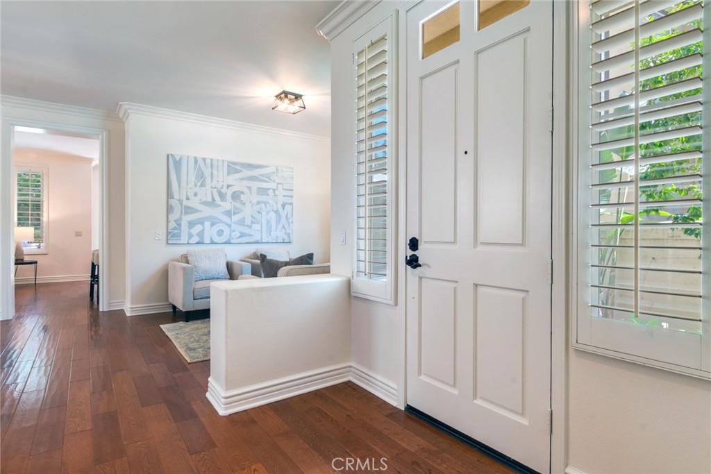 2515 Lewis Drive Tustin, CA 92782 - Photo 3 of 34 a living room with furniture and wooden floor