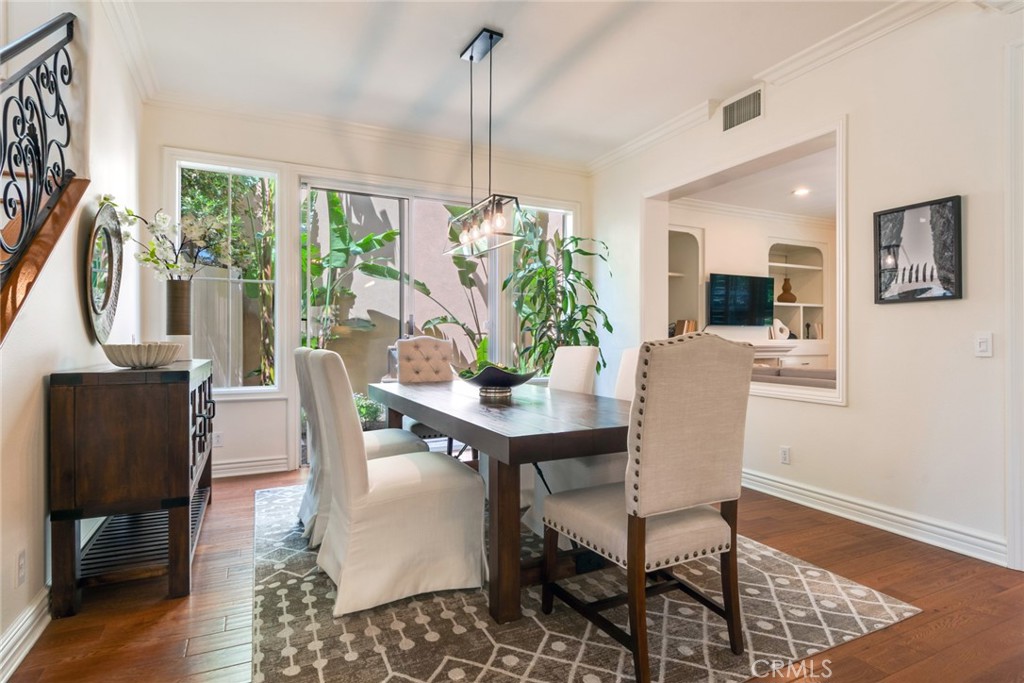 2515 Lewis Drive Tustin, CA 92782 - Photo 5 of 34 a view of a dining room with furniture window and wooden floor