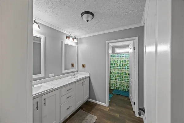 a livingroom with furniture and gym equipment