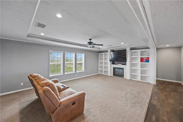 a bedroom with a bed and a table in it