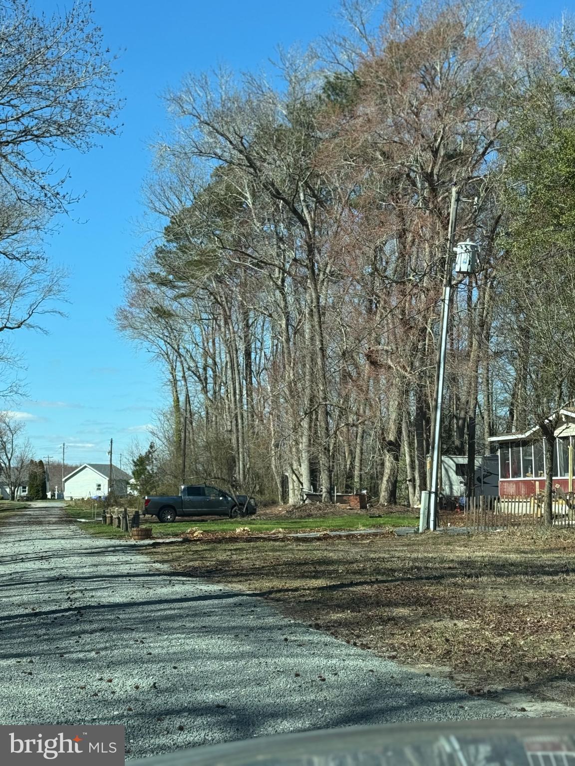 36129 New Marydels Road Frankford, DE 19945 - Photo 3 of 6 a backyard of a house with lots of green space