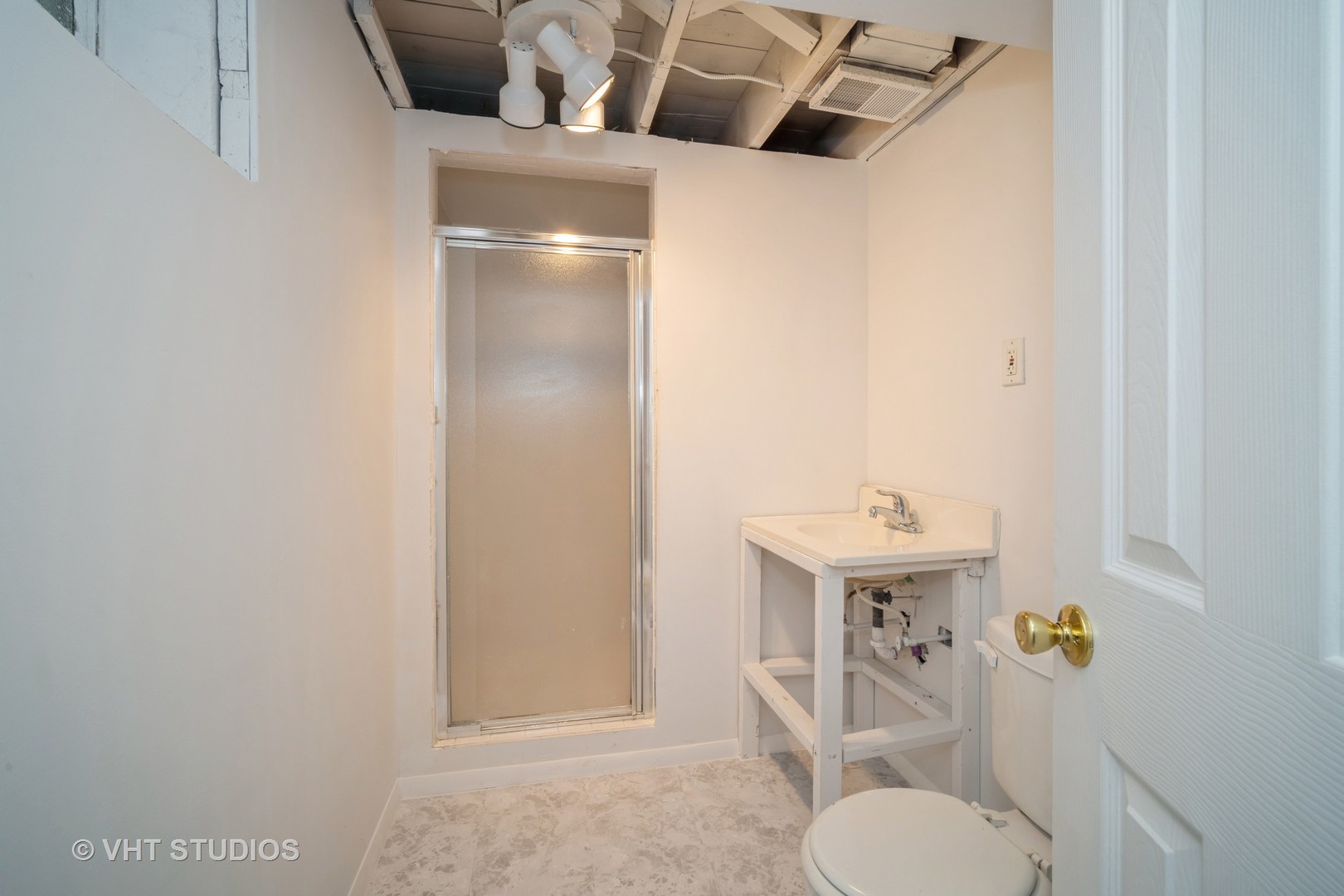 1126 Whitfield Road Northbrook, IL 60062 - Photo 12 of 14 a bathroom with a sink toilet and mirror