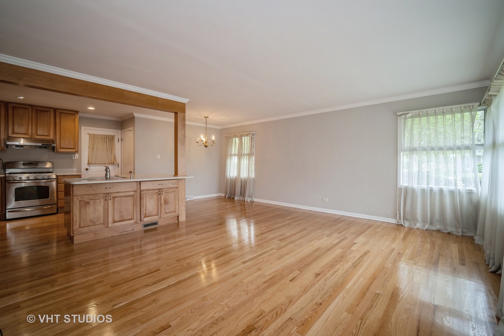 1126 Whitfield Road Northbrook, IL 60062 - Photo 4 of 14 a view of kitchen with cabinets and wooden floor