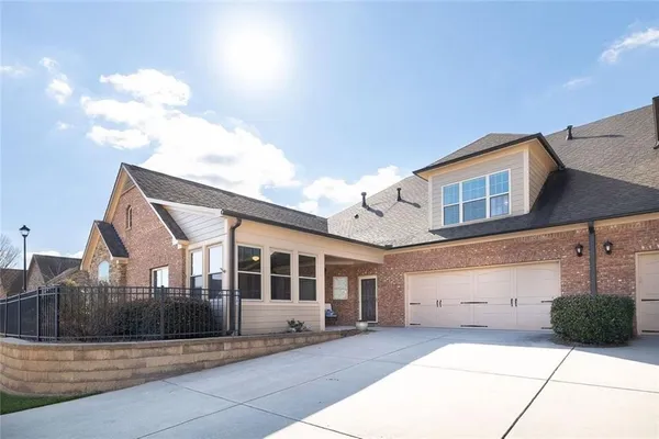 a front view of a house with a garage