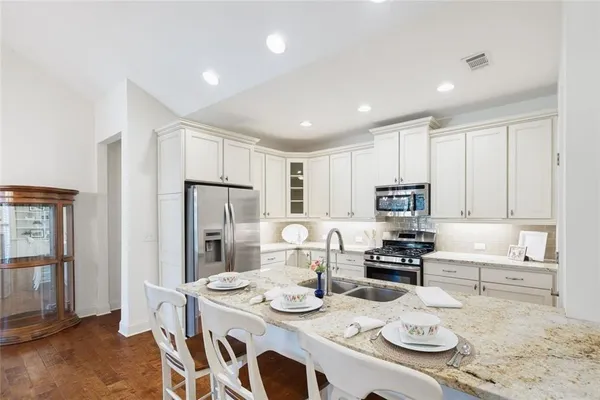 a living room with furniture and windows