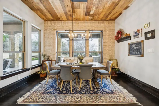a dining room with wooden floor