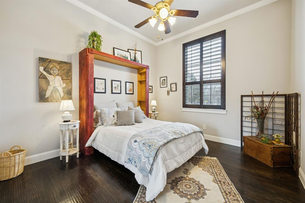 1641 Knox Road Keller, TX 76262 - Photo 21 of 40 a bedroom with a bed and wooden floor