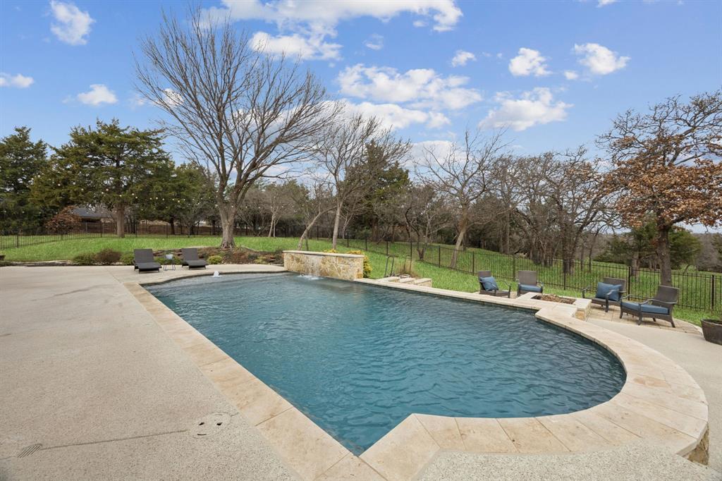 1641 Knox Road Keller, TX 76262 - Photo 33 of 40 a view of a swimming pool with a sitting area