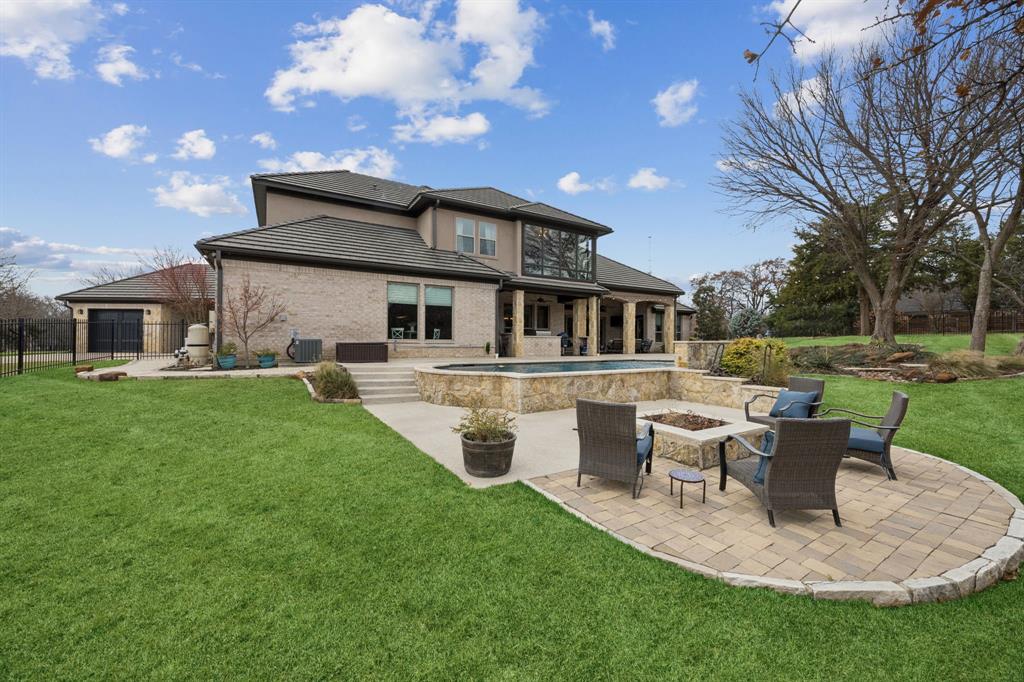 1641 Knox Road Keller, TX 76262 - Photo 35 of 40 a view of a house with a backyard porch and sitting area
