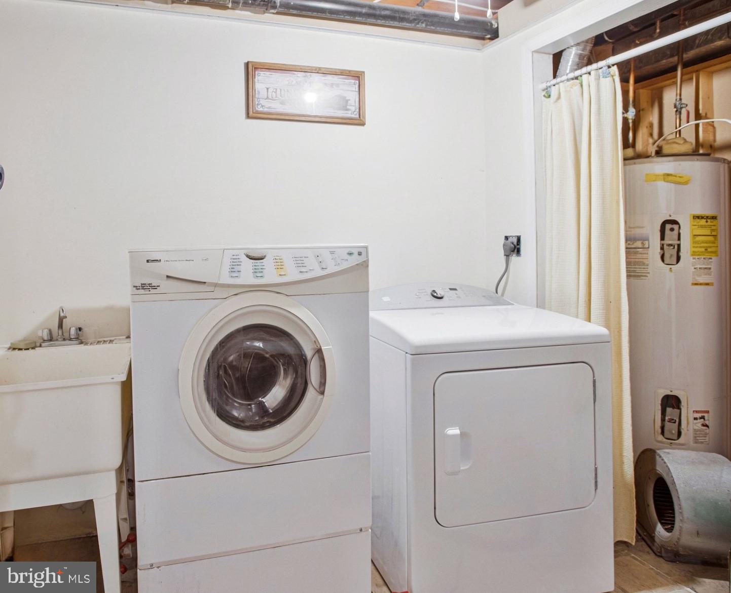 392 S Shore Prince Frederick, MD 20678 - Photo 24 of 30 Functional laundry space with essentials.