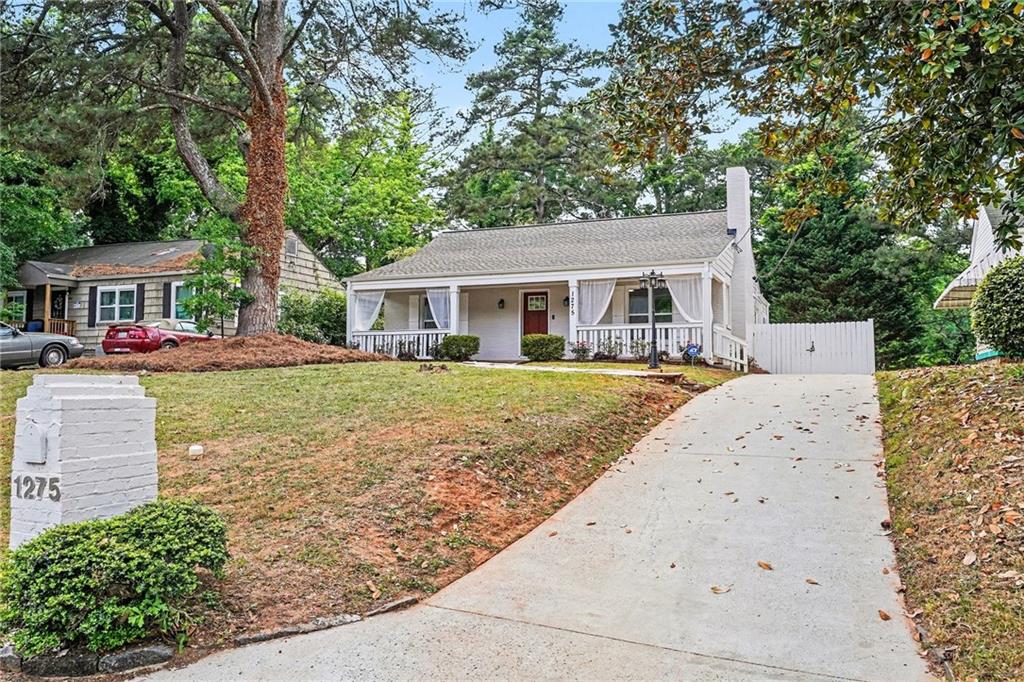 1275 Westridge Road Southwest Atlanta, GA 30311 - Photo 34 of 34 front view of house with a yard