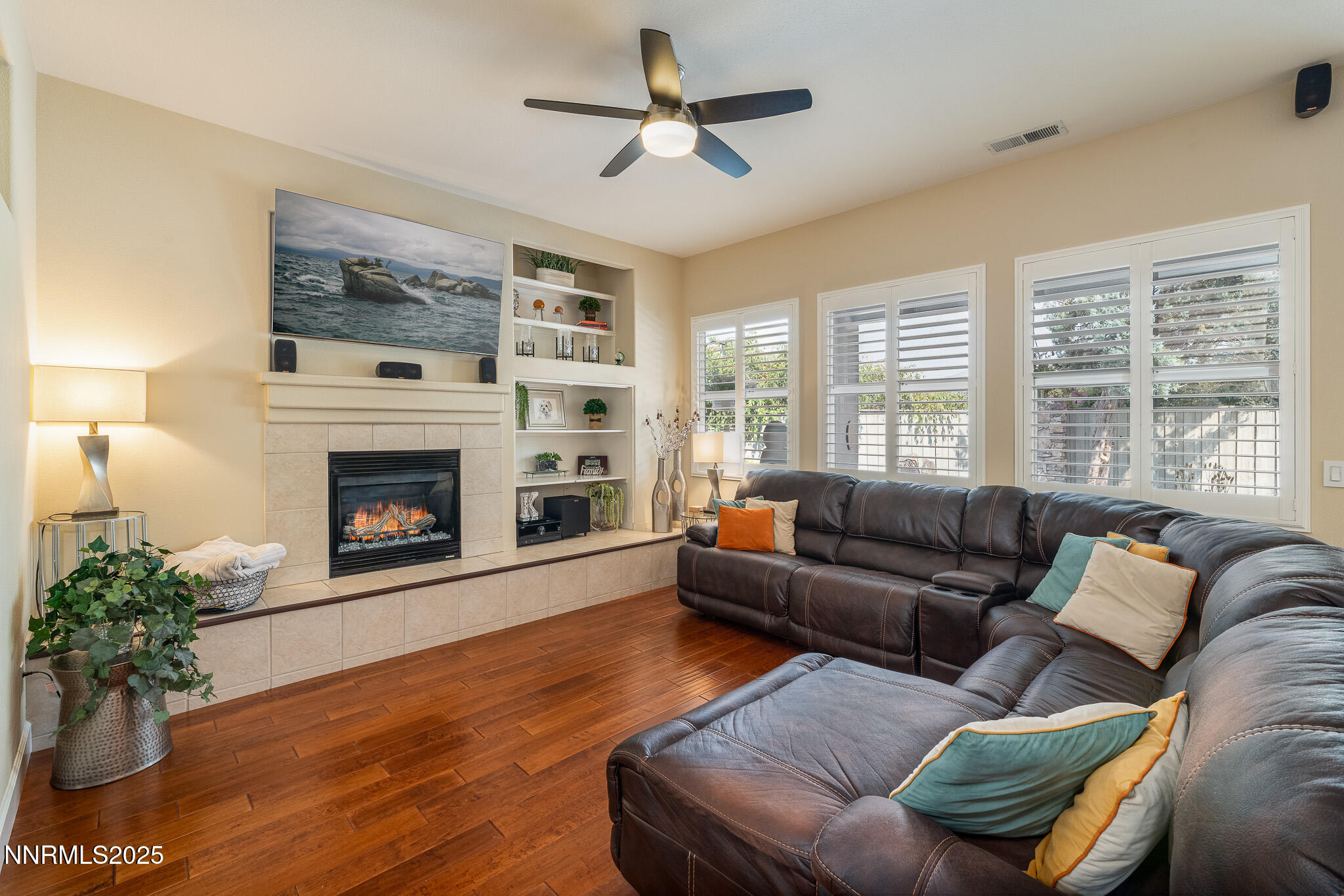 10600 Blue Moon Court Reno, NV 89521 - Photo 13 of 36 a living room with furniture and a fireplace