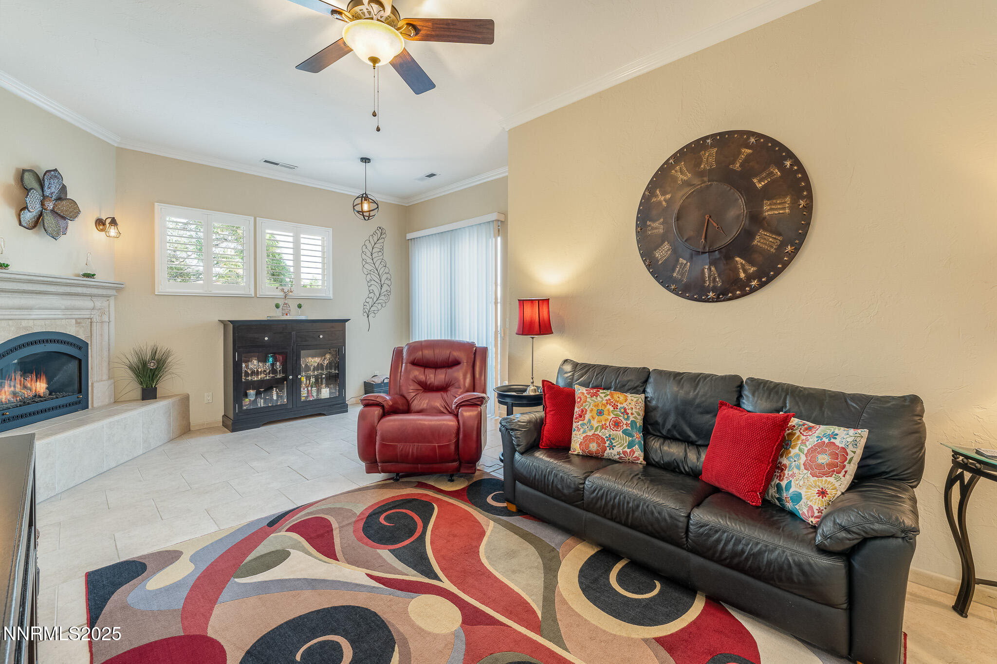 10600 Blue Moon Court Reno, NV 89521 - Photo 25 of 36 a living room with furniture and a fireplace