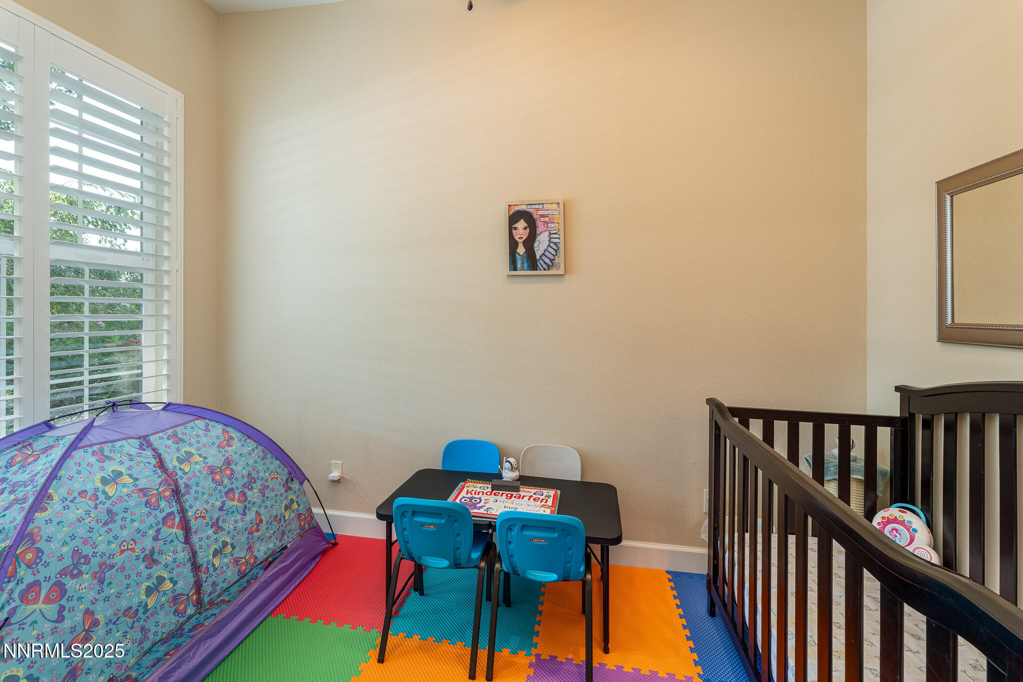 10600 Blue Moon Court Reno, NV 89521 - Photo 28 of 36 a bedroom with a bed and a window