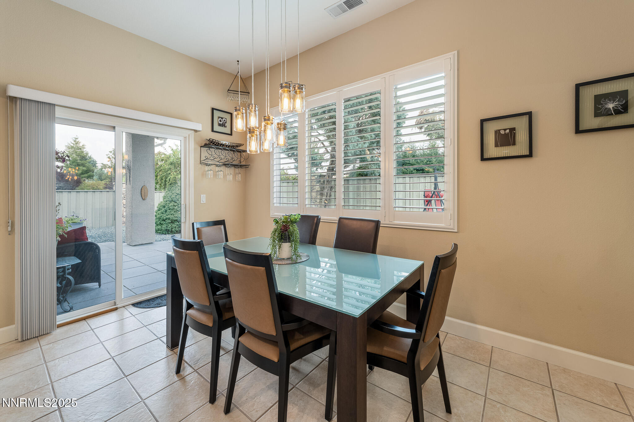 10600 Blue Moon Court Reno, NV 89521 - Photo 10 of 36 a view of a dining room with furniture window and outside view