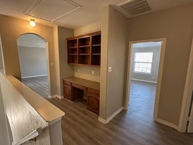 a view of livingroom with furniture and wooden floor