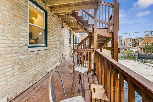 a view of balcony with a potted plant