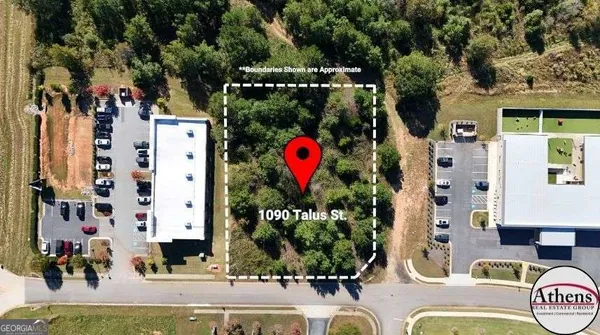 an aerial view of a house with a swimming pool
