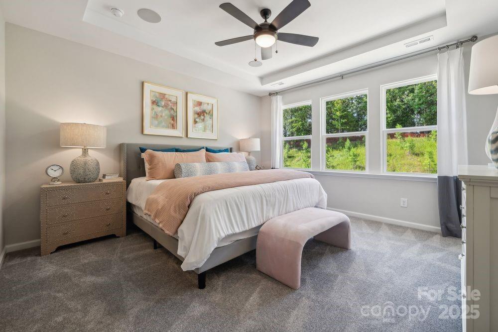 8661 Miles Gap Road Indian Land, SC 29707 - Photo 1 of 31 a bed room with a bed and a large window
