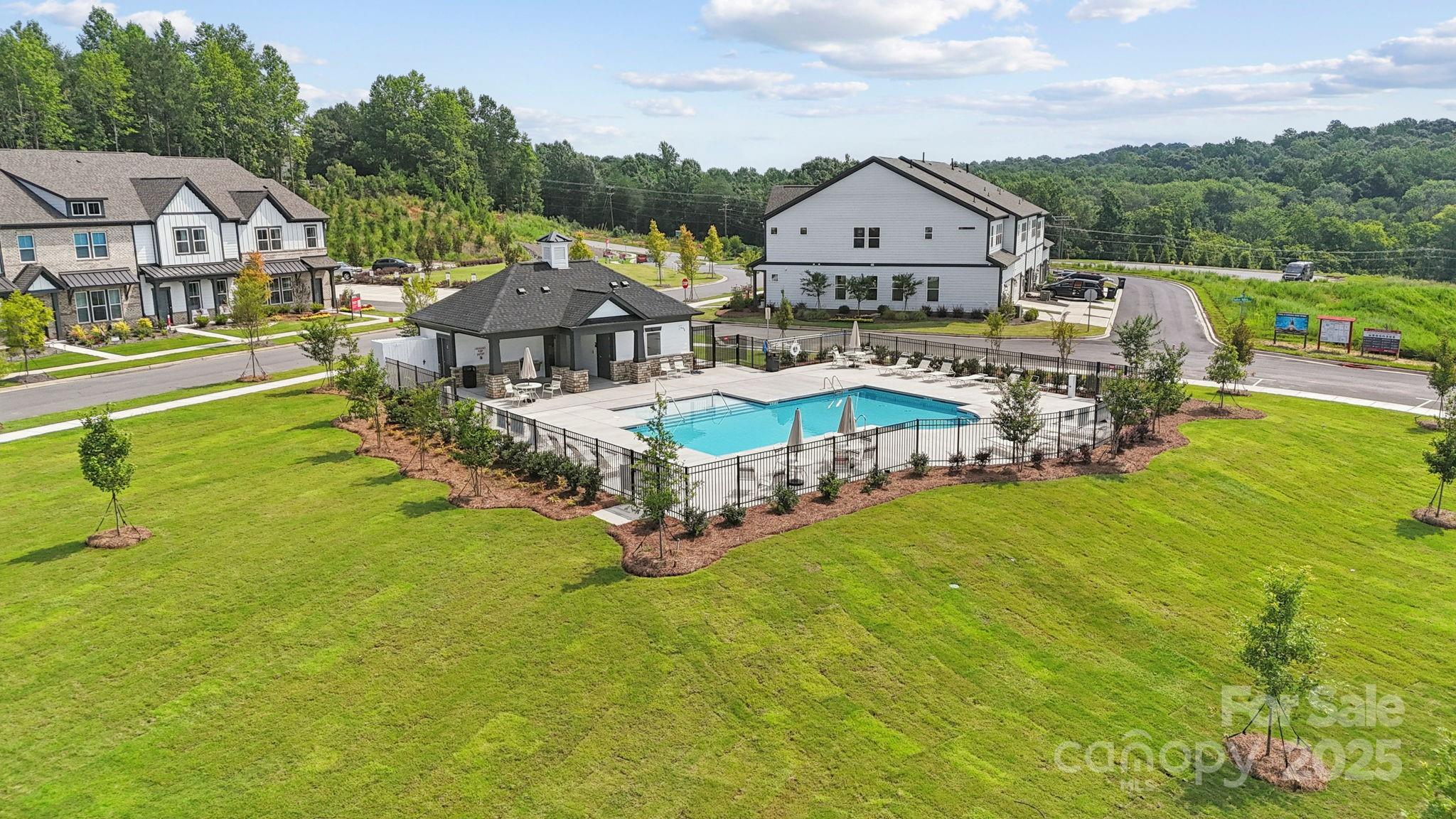 8661 Miles Gap Road Indian Land, SC 29707 - Photo 20 of 31 an aerial view of a house with a big yard and large trees