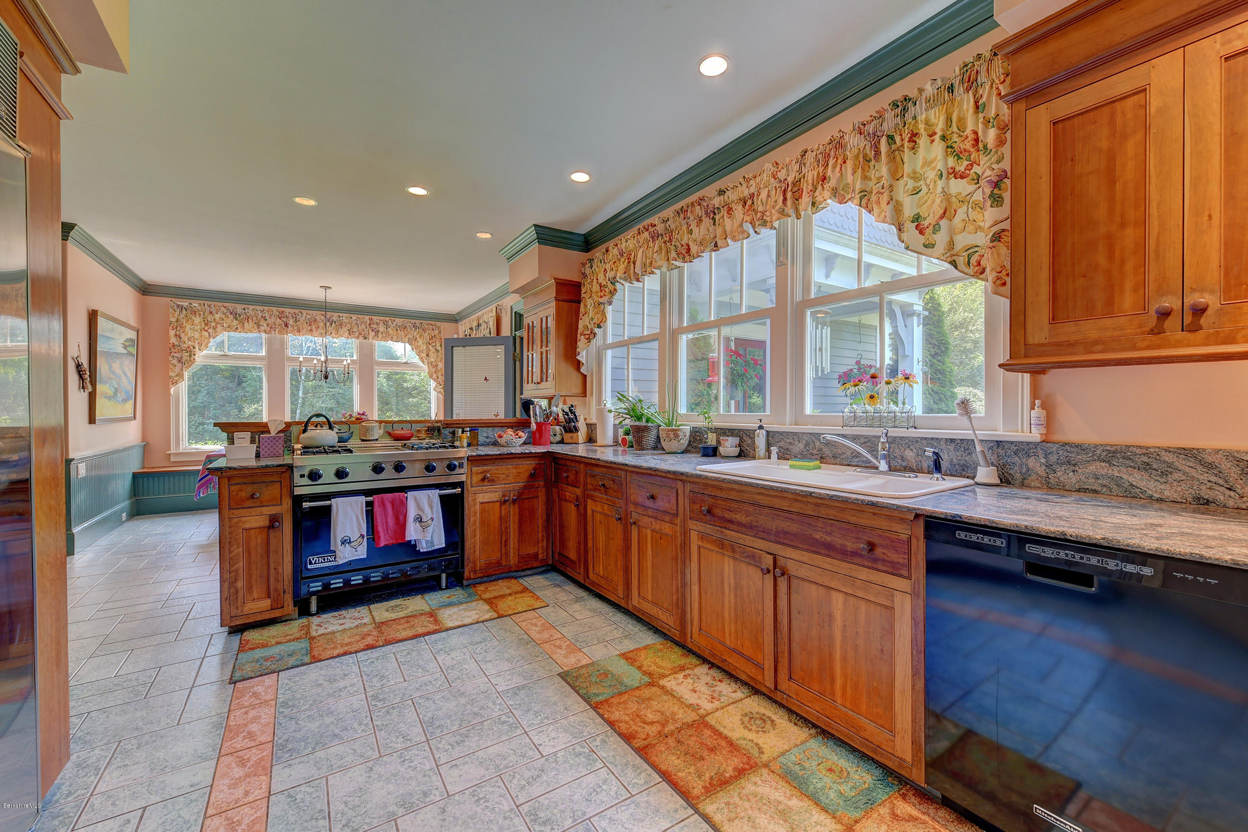 201 Rossiter Road Richmond, MA 01254 - Photo 13 of 52 a large kitchen with stainless steel appliances granite countertop a large stove a sink dishwasher and cabinets with wooden floor