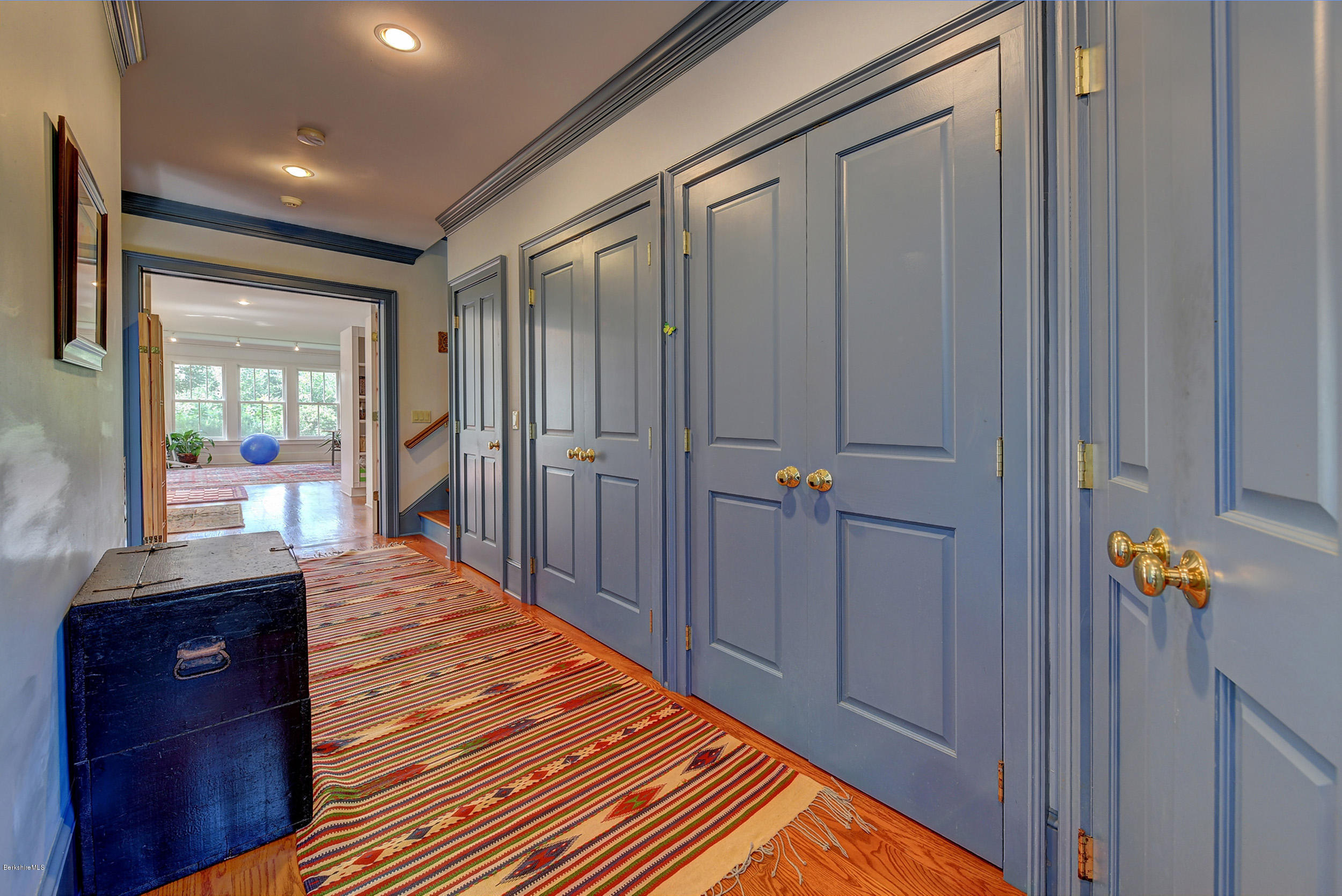 201 Rossiter Road Richmond, MA 01254 - Photo 19 of 52 a view of a hallway with wooden floor and a dresser