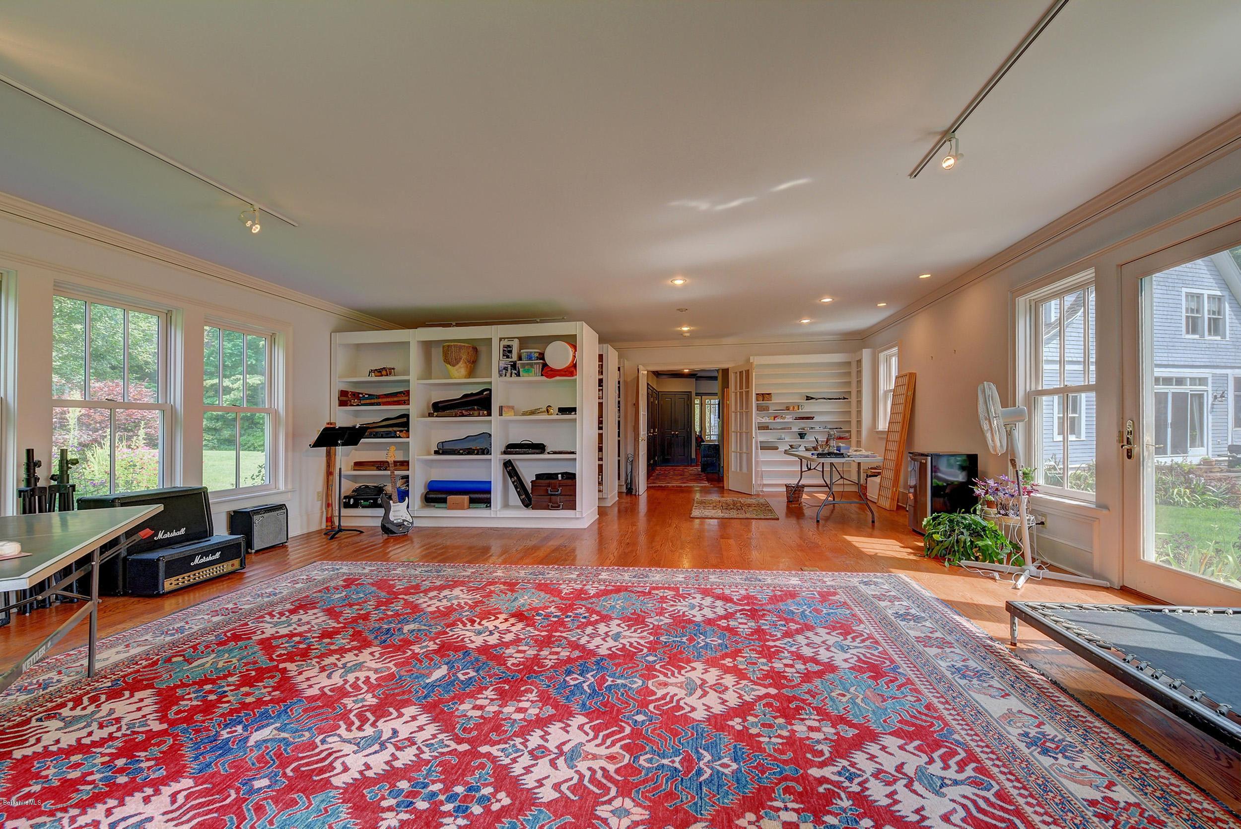 201 Rossiter Road Richmond, MA 01254 - Photo 21 of 52 a room with furniture and a flat screen tv