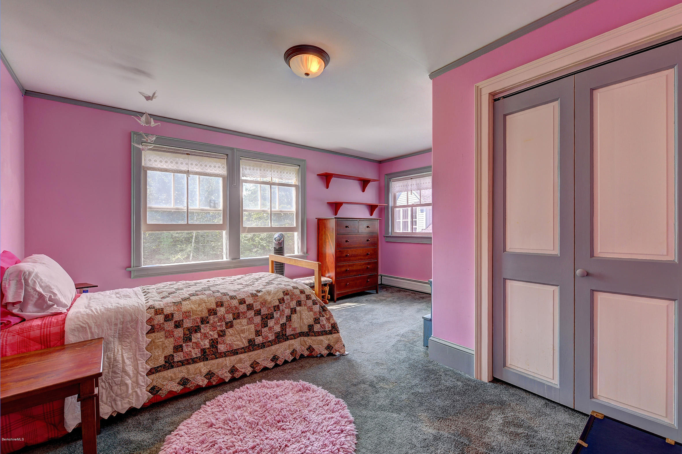 201 Rossiter Road Richmond, MA 01254 - Photo 28 of 52 a bedroom with a bed and a window