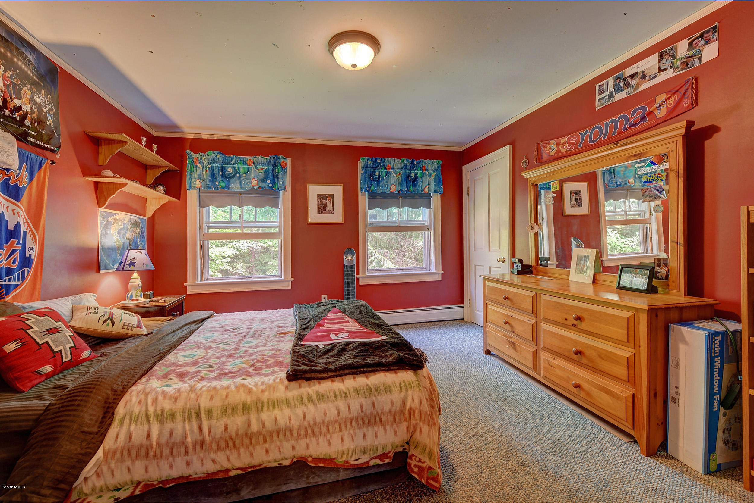 201 Rossiter Road Richmond, MA 01254 - Photo 29 of 52 a bedroom with a bed and wooden floor
