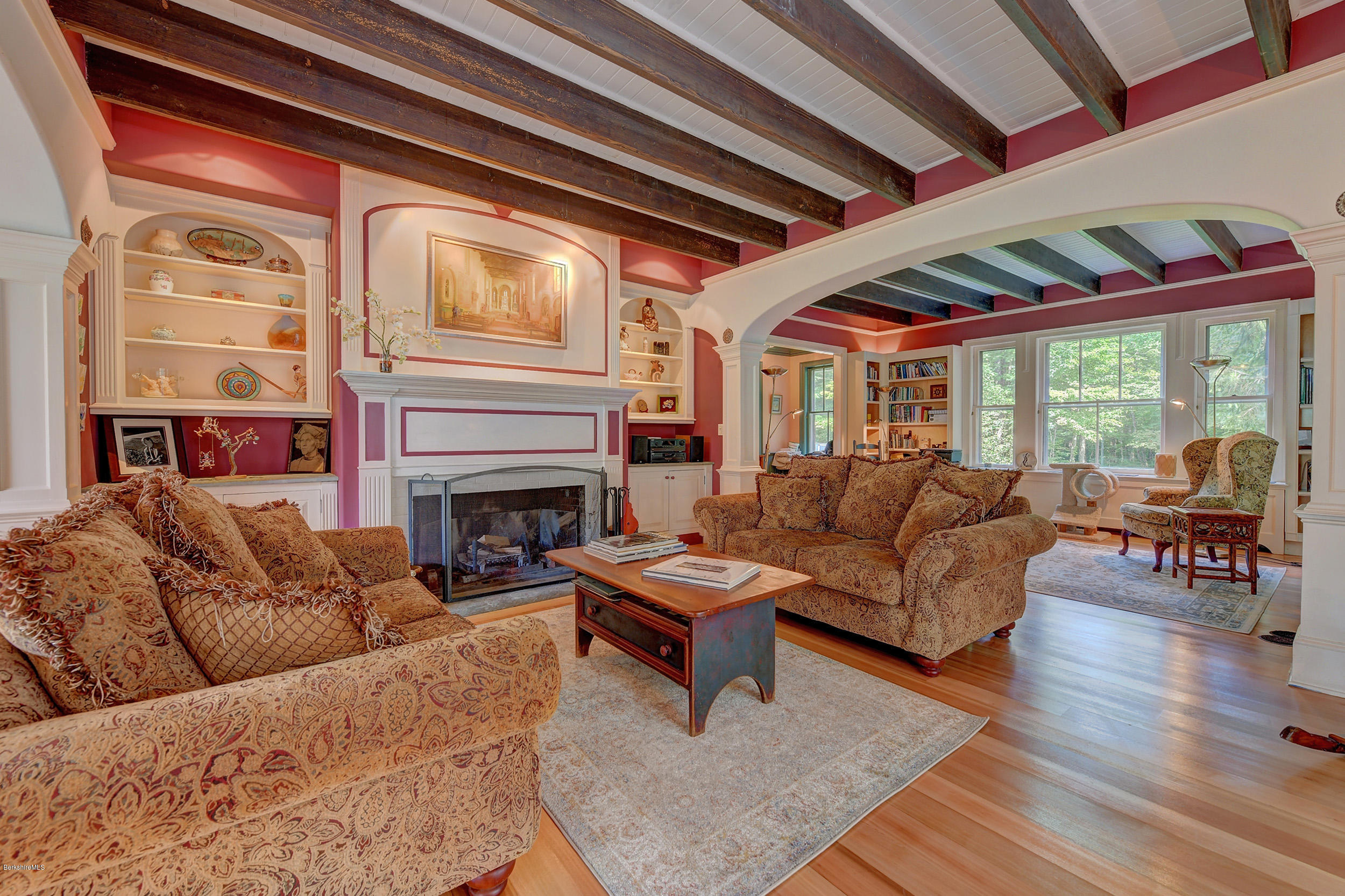 201 Rossiter Road Richmond, MA 01254 - Photo 5 of 52 a living room with furniture a fireplace and a large window