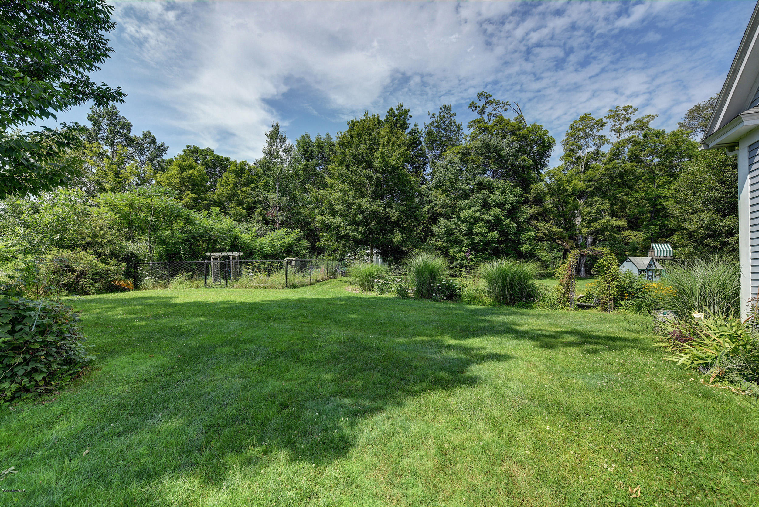 201 Rossiter Road Richmond, MA 01254 - Photo 44 of 52 a view of a green field with a tree