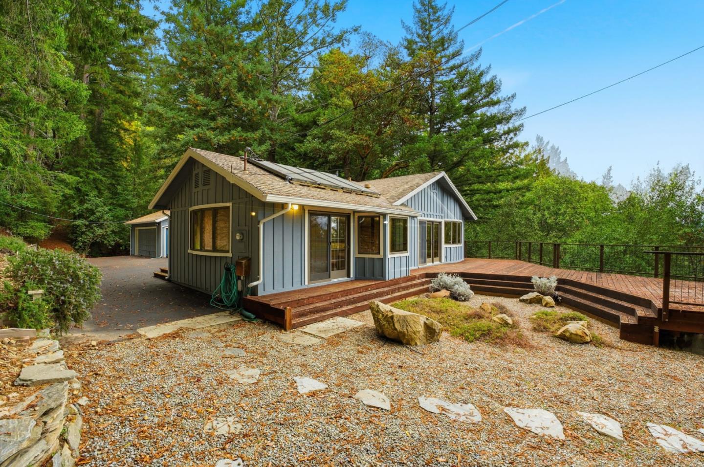 15245 Stetson Road Los Gatos, CA 95033 - Photo 11 of 60 a view of a house with a yard and wooden fence