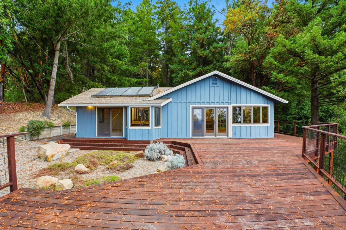 15245 Stetson Road Los Gatos, CA 95033 - Photo 13 of 60 a front view of a house with a yard outdoor seating and barbeque oven