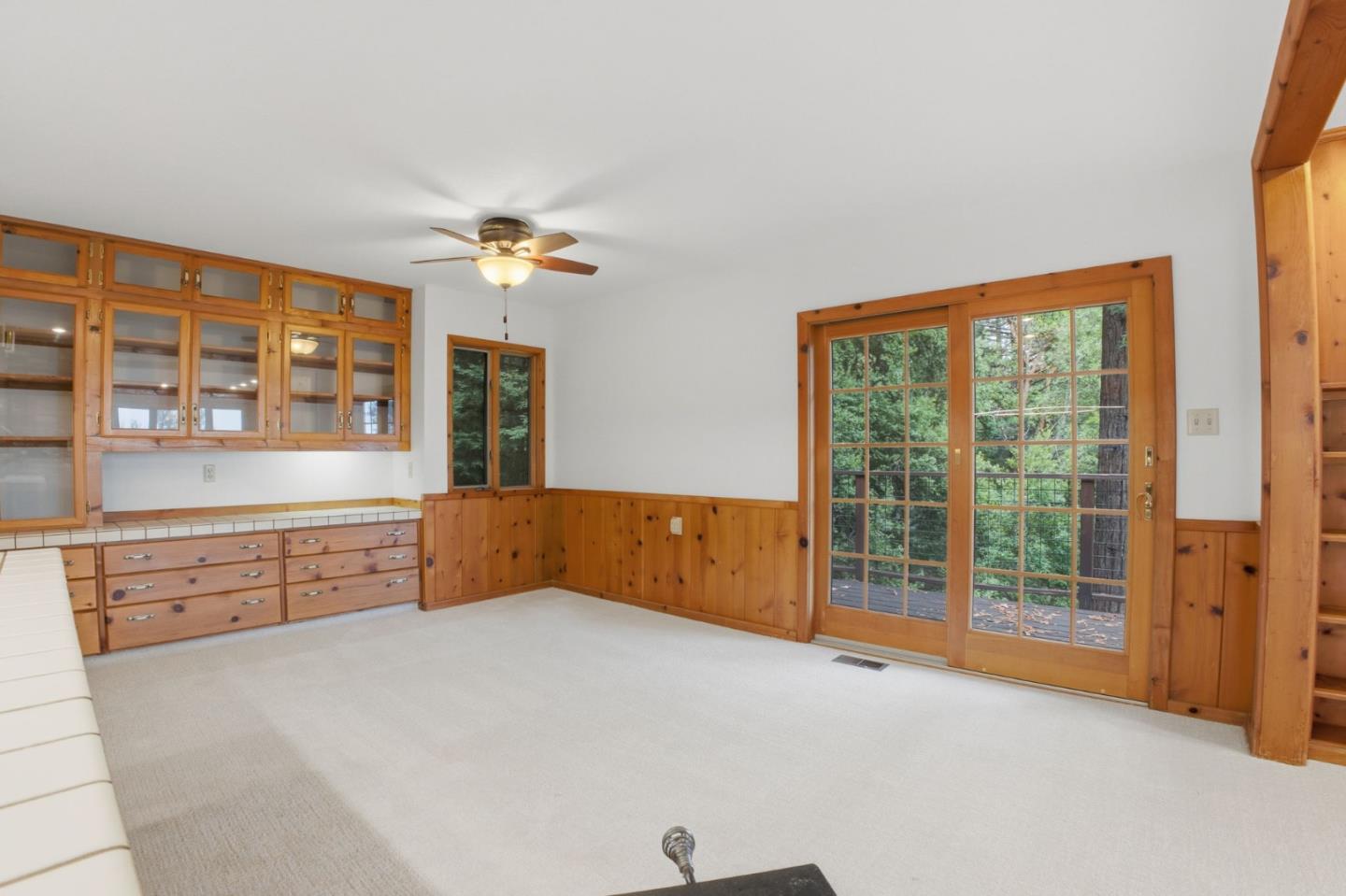 15245 Stetson Road Los Gatos, CA 95033 - Photo 27 of 60 a bedroom with a large bed and a large window