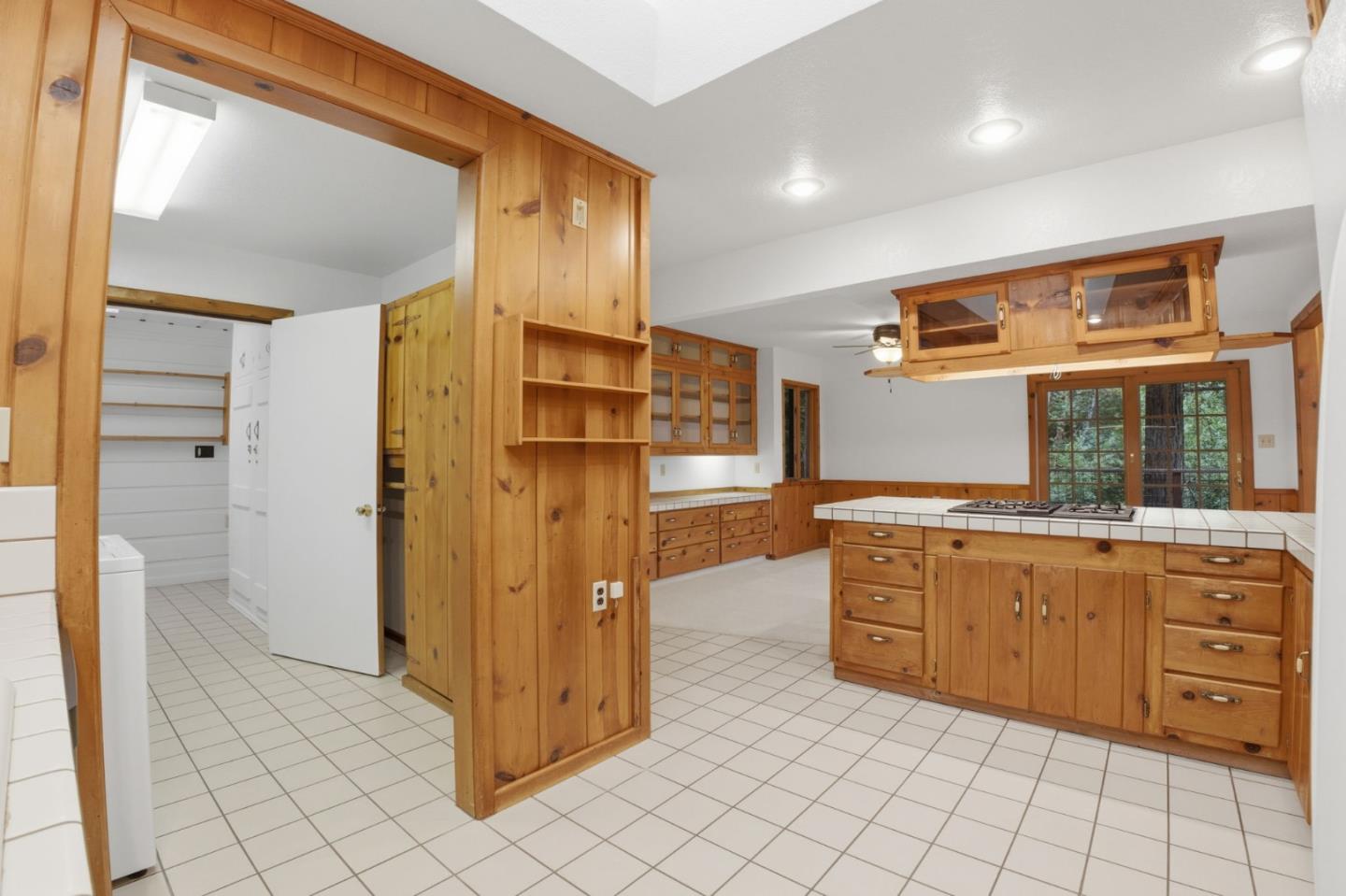 15245 Stetson Road Los Gatos, CA 95033 - Photo 33 of 60 a kitchen with stainless steel appliances granite countertop a refrigerator and a sink