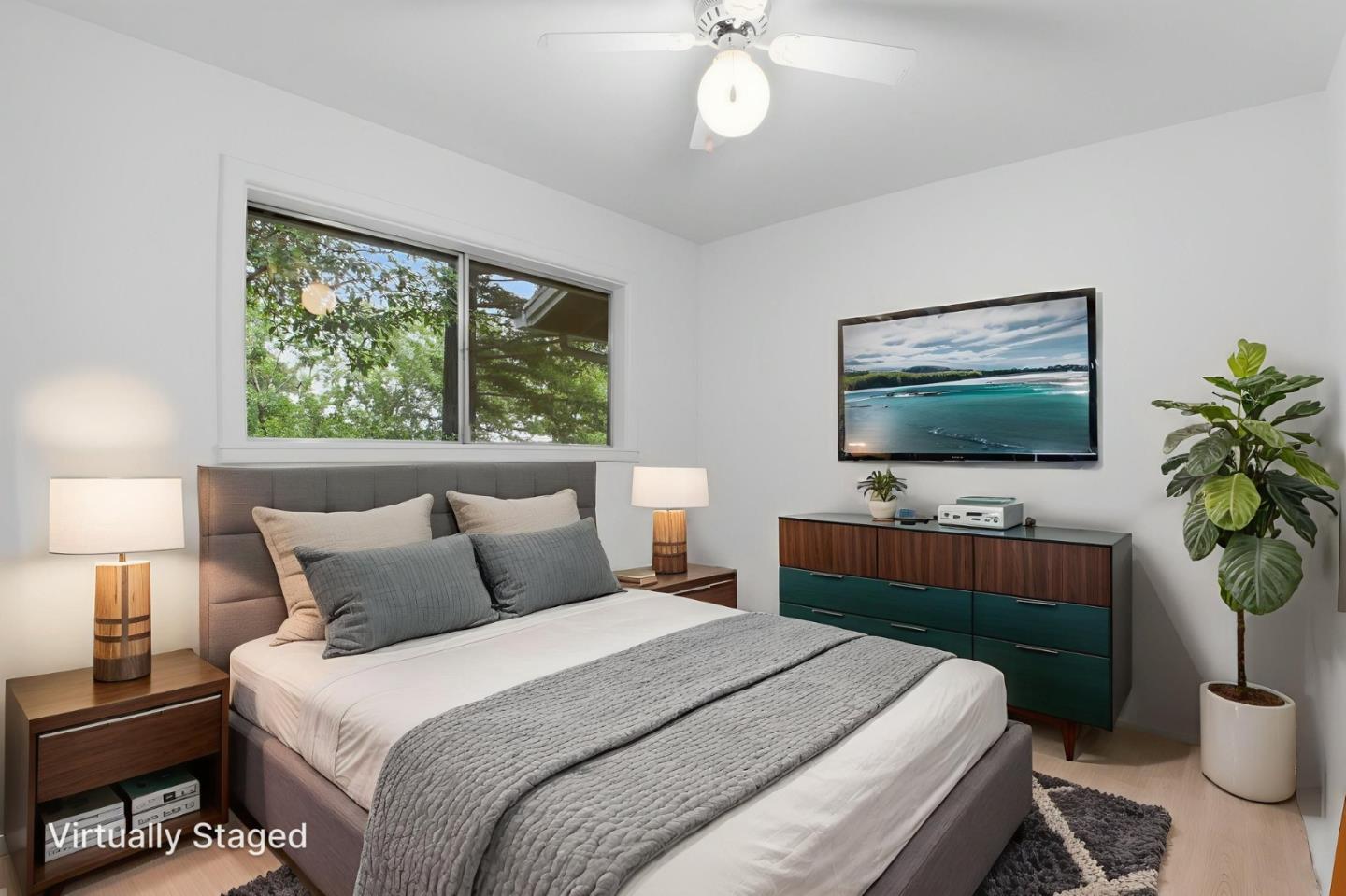 15245 Stetson Road Los Gatos, CA 95033 - Photo 39 of 60 a bedroom with a bed and a flat screen tv