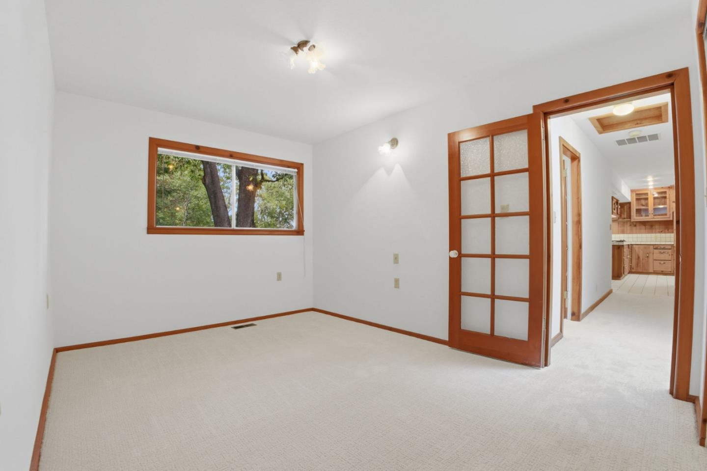 15245 Stetson Road Los Gatos, CA 95033 - Photo 41 of 60 an empty room with windows