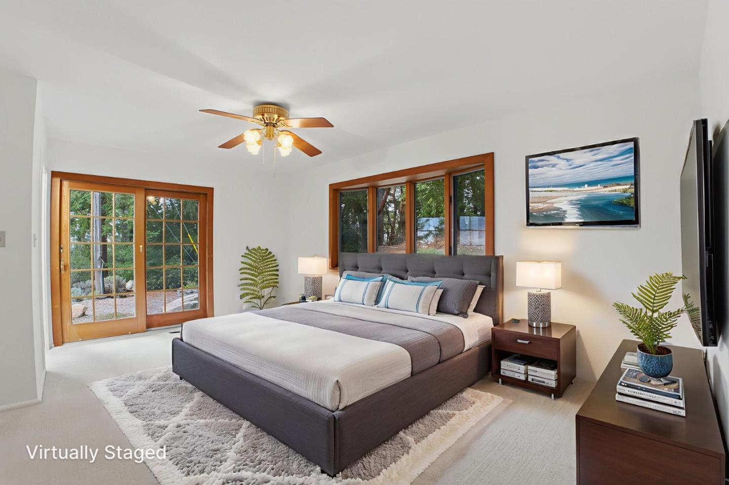 15245 Stetson Road Los Gatos, CA 95033 - Photo 45 of 60 a bedroom with a large bed and a chandelier