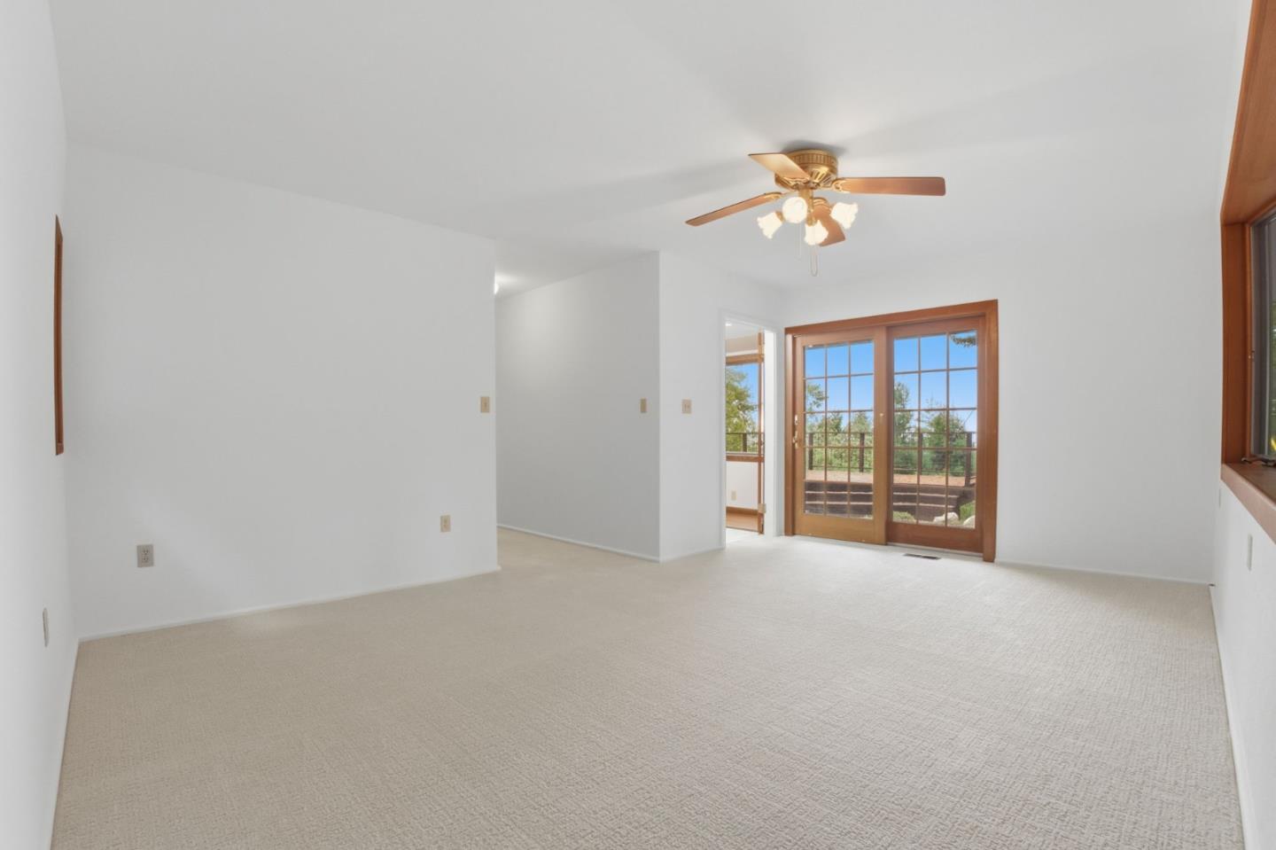15245 Stetson Road Los Gatos, CA 95033 - Photo 46 of 60 wooden floor in an empty room with a window
