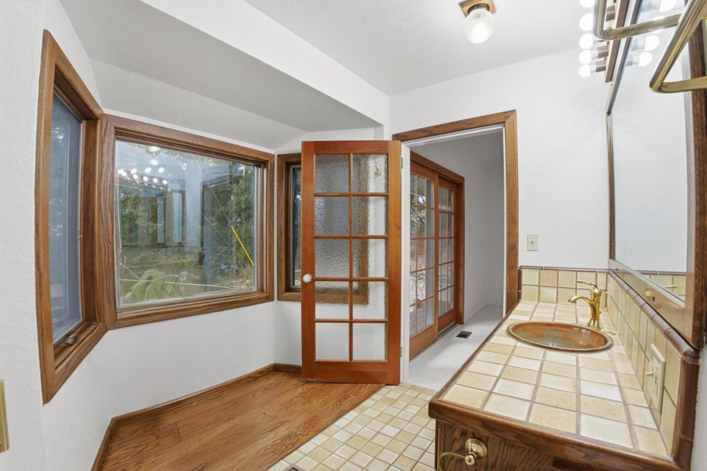 15245 Stetson Road Los Gatos, CA 95033 - Photo 50 of 60 a bedroom with a bed and a window